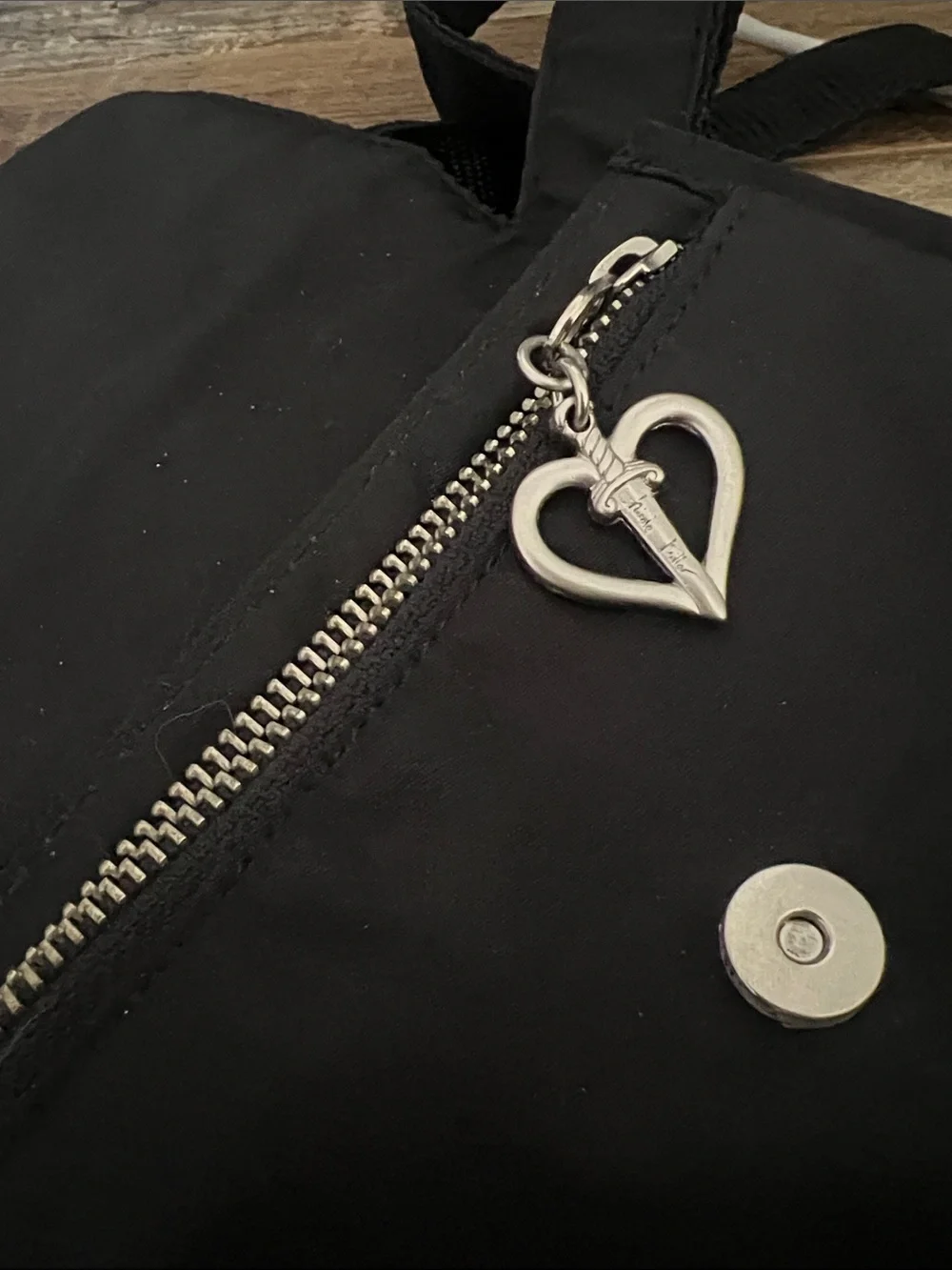 Black Crossbody Shoulder Bag with Winged Emblem by Nicole Miller